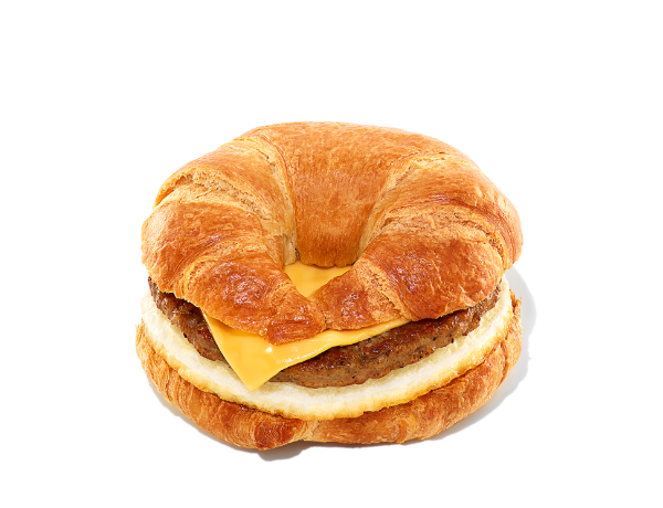 A sausage, egg and cheese sandwich on a croissant